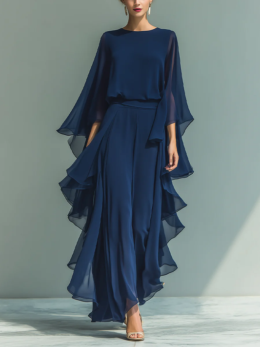 Aurora | Elegant chiffongklänning med volanger