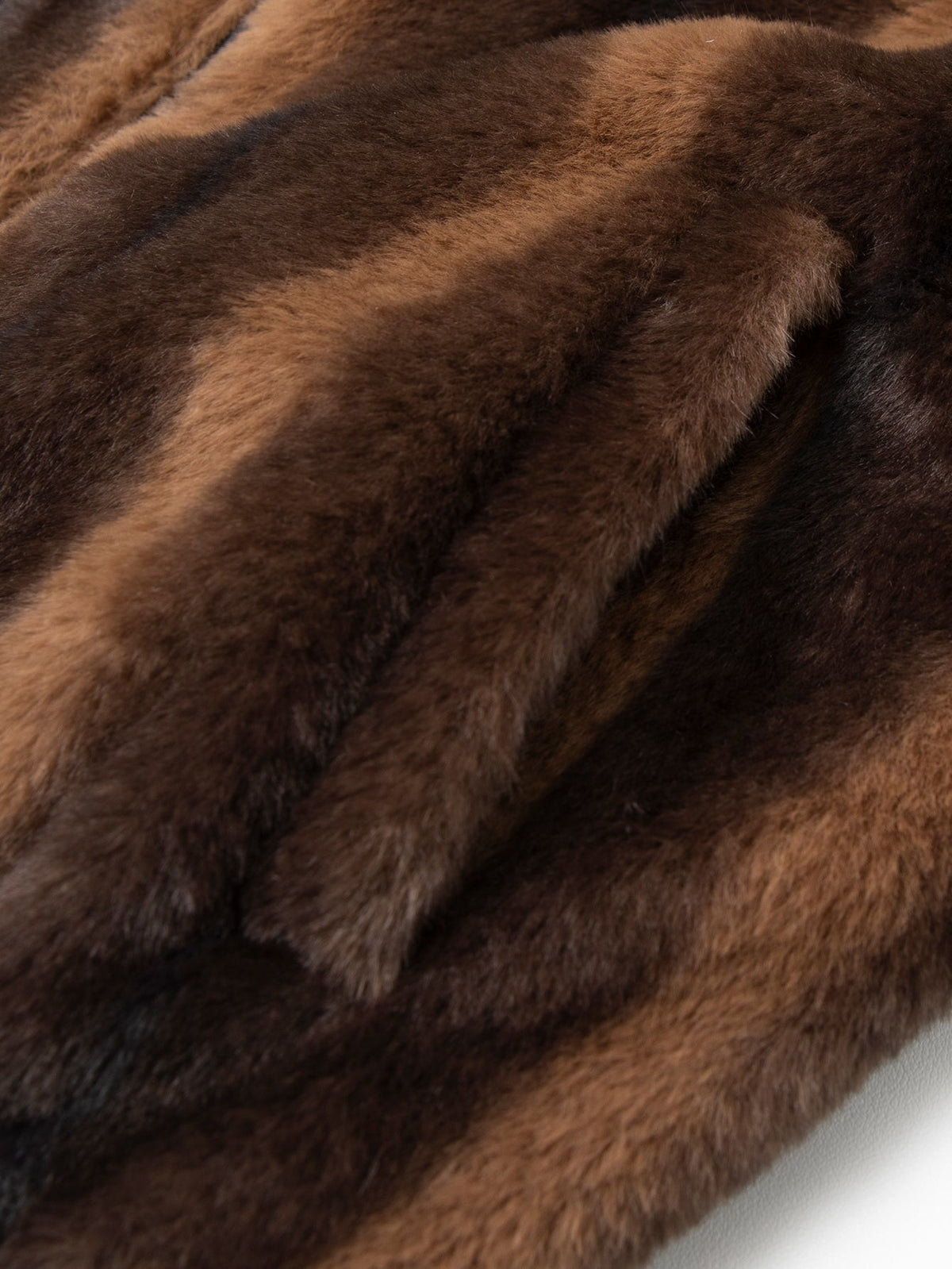 Fuskpälsjacka med blixtlås