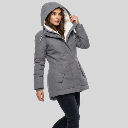 NUA | ELEGANTE CHAQUETA IMPERMEABLE