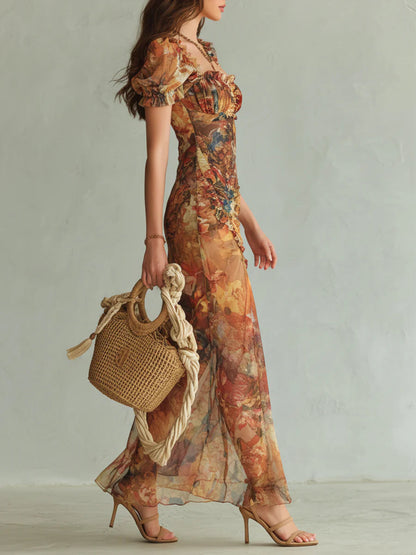 Abito lungo in chiffon arancione con stampa di dipinto a olio in stile bohémien