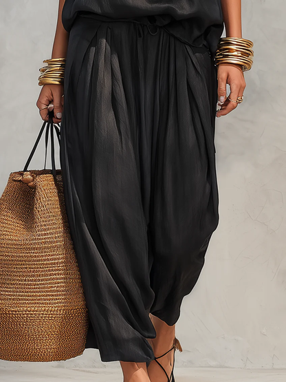 Completo Serena composto da top all'americana e pantaloni a pieghe